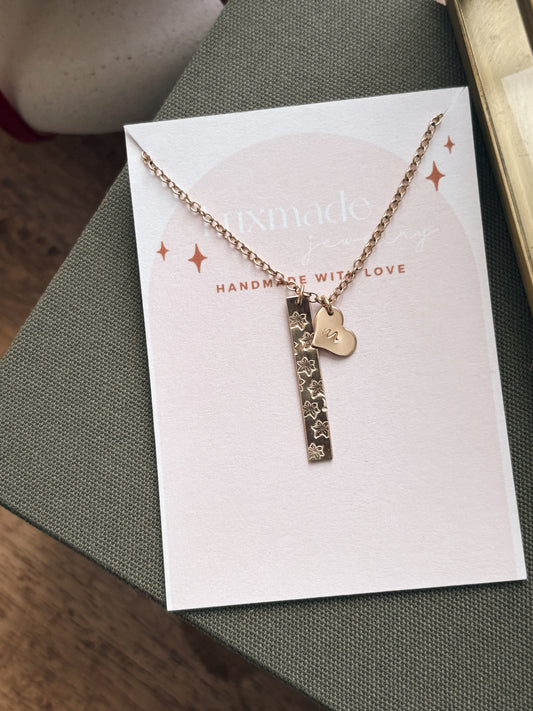 Birth flower and initial necklace