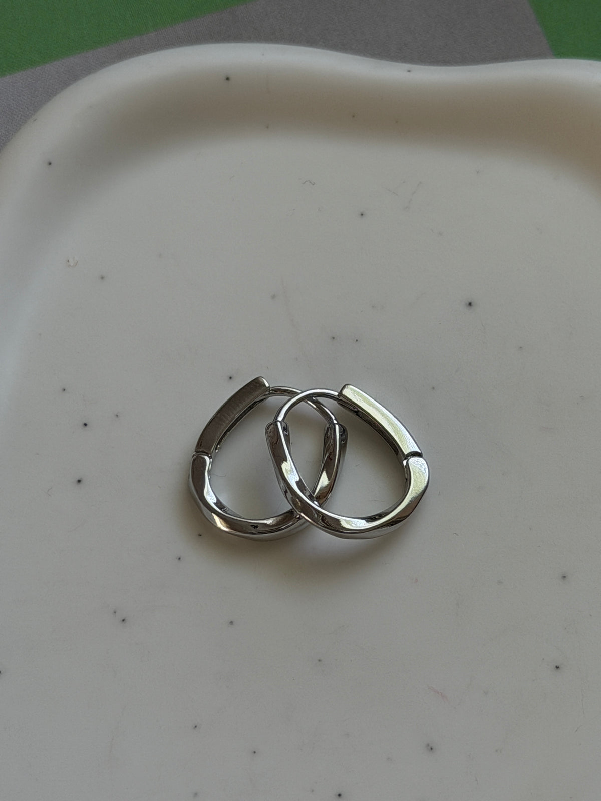 Oval Twist Silver Hoops